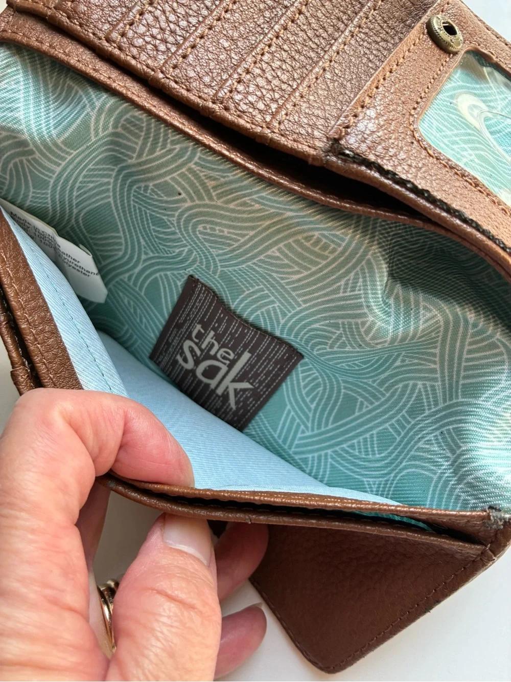 The Sak Tan Brown Embossed Floral Zip Wallet